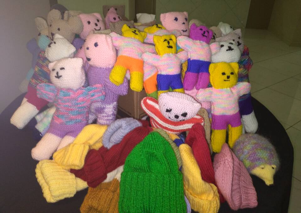Parkes Que Club members and community members have been knitting bears for our emergency services to give to children who have experienced trauma. Picture supplied